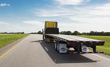 4000S Flatbed Rear Corner Angle Highway View